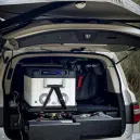 Evakool 50L Down Under4 > 4wd Lights and Camping Online Store Evakool 50L Down Under II Dual Zone Fridge Freezer in station wagon cargo area