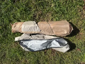 4 person camping tent packed into carry bag with storage bag and accessories