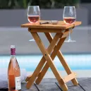 Portable Picnic Table1 > 4wd Lights and Camping Online Store Portable Picnic Table with Wine Glass Holders holding wine glasses beside a pool