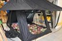 Open roof top tent showing entrance and sleeping area