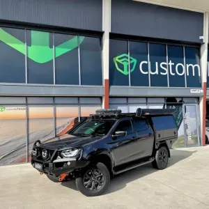 Mazda BT50 2022+ dual battery system with Australian-Made tray and lithium setup mounted behind the rear seat for clean, reliable 12V power.